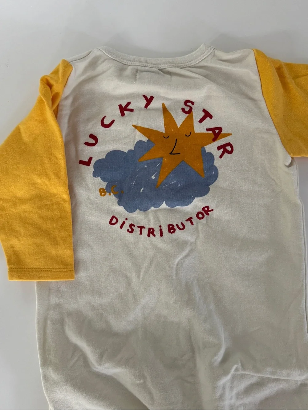 Bobo Choses Cream Footie with Yellow Sleeves and Chest Patch